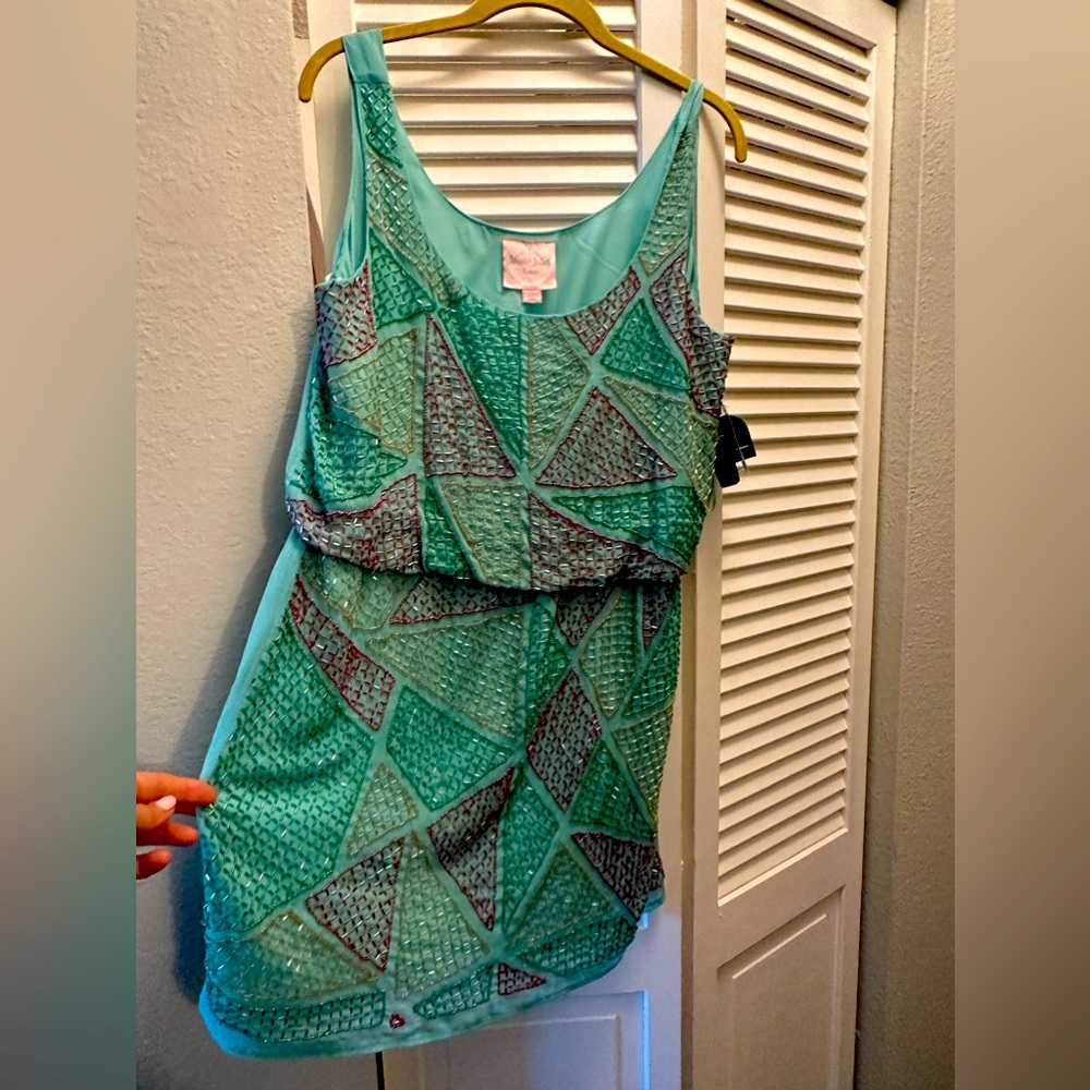 Aqua  green sparkly mink dress. Can be casual or dressy !